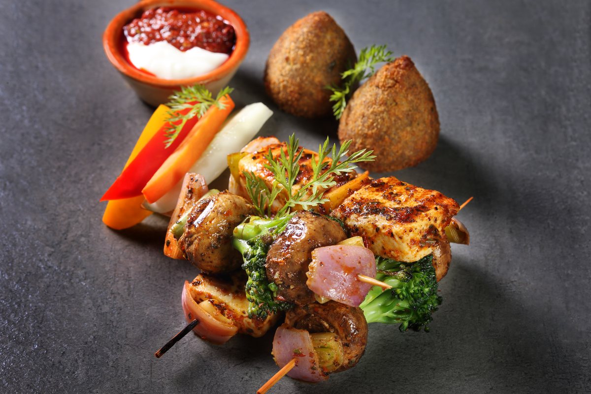 Assorted grilled kebabs with kibbeh and dip